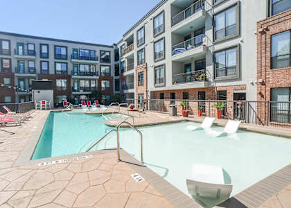 our apartments offer a swimming pool and an outdoor patio