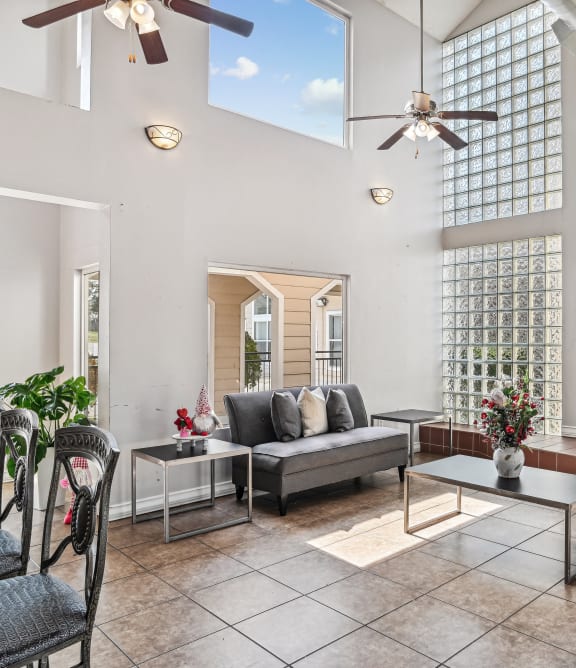 an open living room with couches and a fireplace  at Wellington Farms, Charlotte