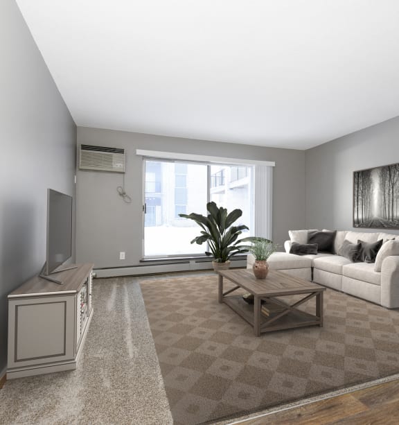 Maplewood Apartments | a living room with grey walls and a large window
