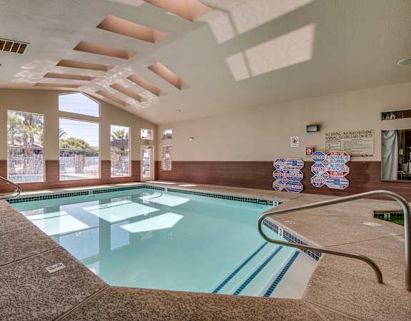 a swimming pool in the lobby of a hotel
