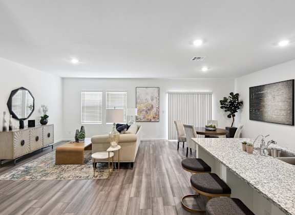 living room and dining room with contemporary furnitures and white walls