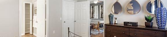 A bedroom with a bed, dresser, mirrors and a ceiling fan at Cumberland Place Apartment Homes, Tyler, TX 75703