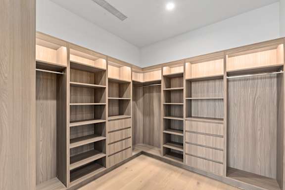 A room with wooden shelves and drawers. at Olympic + Hill Apartments, Apartments, Los Angeles, CA