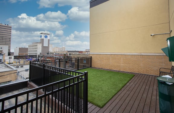 a small astroturf lawn on the rooftop of a building at Dillard Apartments in Fargo, ND 58102