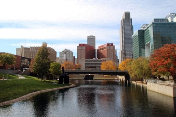 a view of the city from a bridge over a river