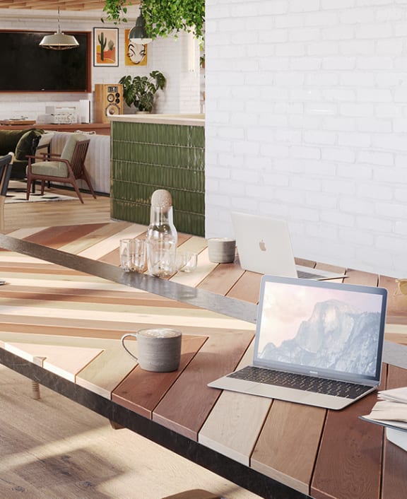 an empty meeting room with chairs and a long table