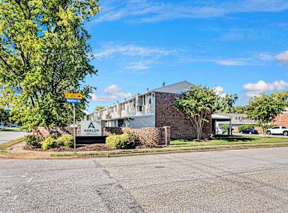 Avalon is a residential complex with a parking lot in front.