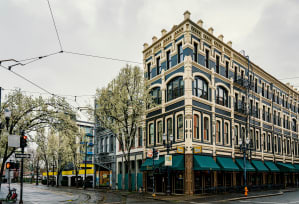a building on the corner of a city street