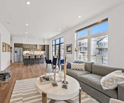 a living room with a couch and a coffee table at Four23/Hoge, Cincinnati, OH