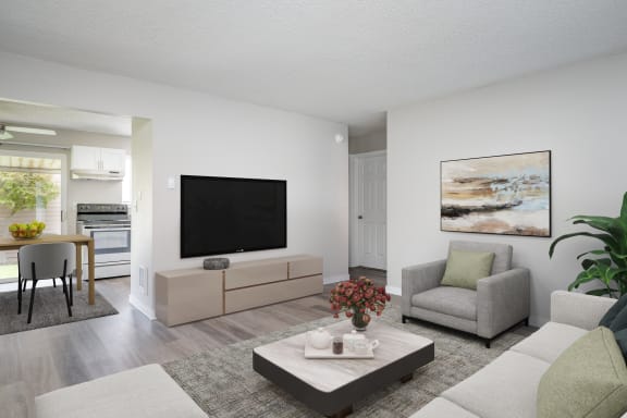 an empty living room with sliding glass doors to a balcony
