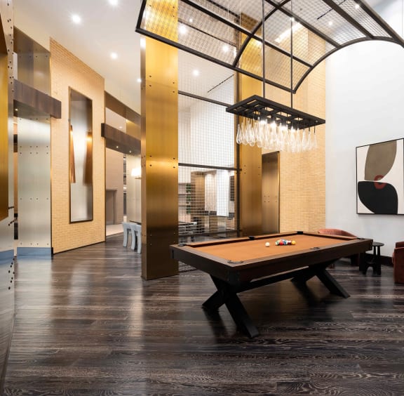 a billiards table in the lobby of a building