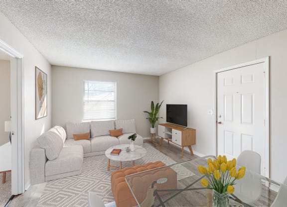 Spacious living room with vinyl flooring