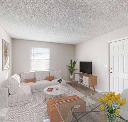 a living room with white walls and a glass table with a vase of yellow flowers on