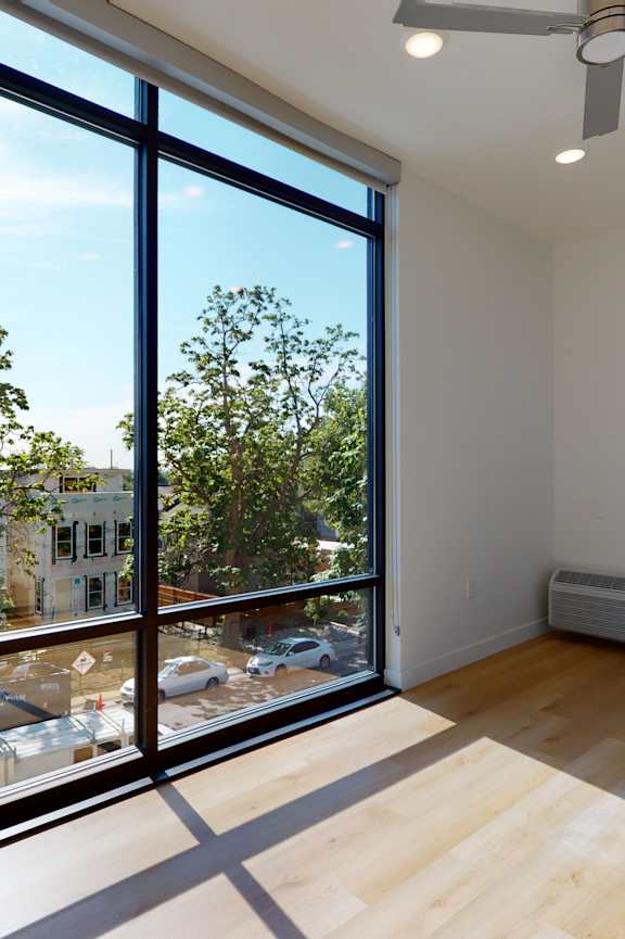 A Room with a Large Window at Proto Apartments, Denver, CO