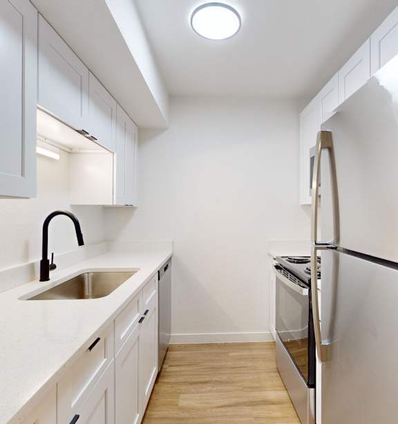 Eat-In Kitchen With Sink at Villa Parada Apartments, Englewood, Colorado