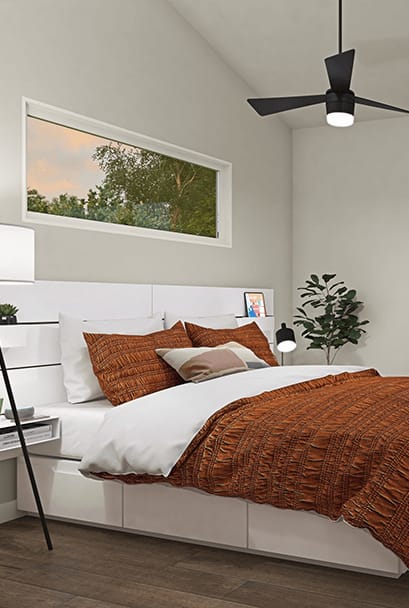 a bedroom with a bed and a ceiling fan
