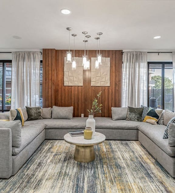 a living room with couches and a table
