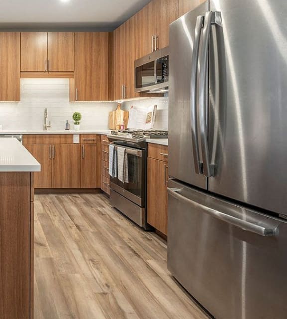 Arlington 360 Apartments Kitchen Fully Equipped Kitchen with Stainless Steel Appliances Dishwasher and Garbage Disposal