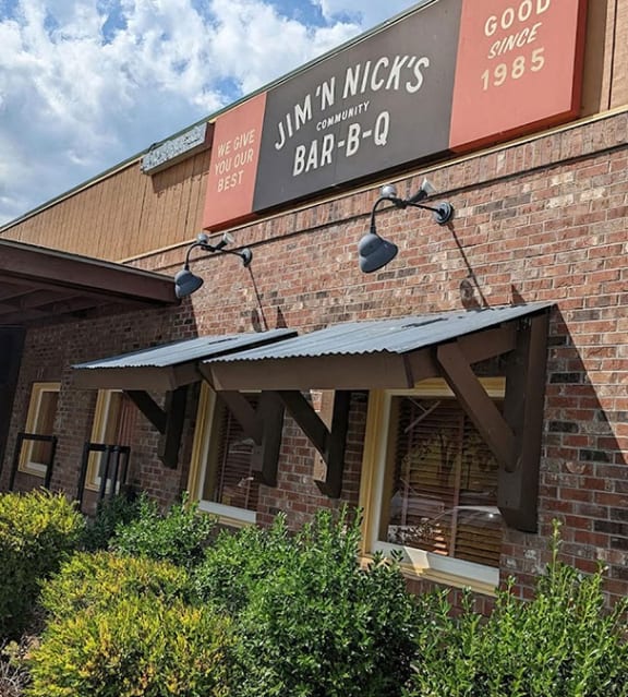 Grab a drink and some delicious barbeque at Jim 'N Nicks Community Bar-B-Q near Novel Harpeth Heights