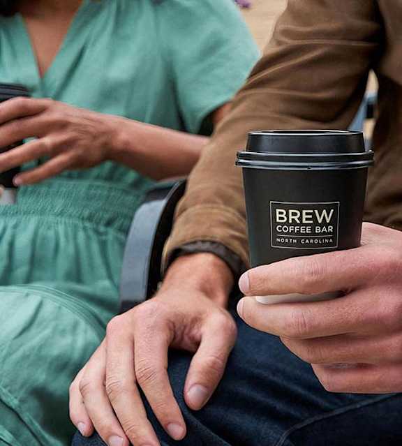 Have a coffee from the local Brew Coffee Bar near Novel Cary