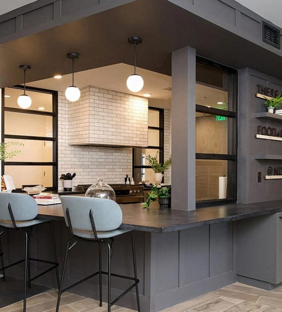 Multiple private office areas with desks and cozy lighting at Novel Cary