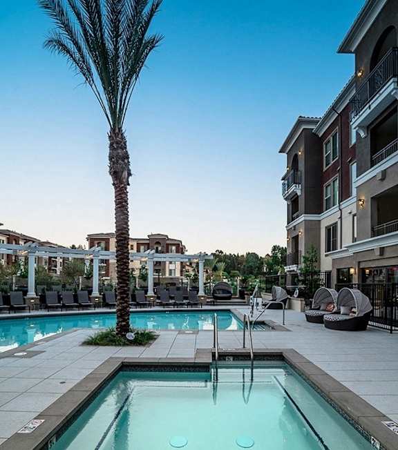 Adagio on the Green Apartments in Mission Viejo, California Pool with Lounge Chairs