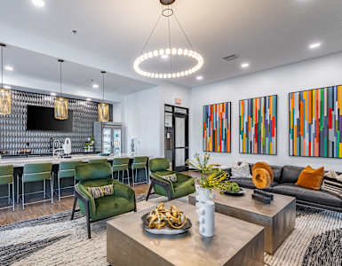 a living room with a kitchen and a dining room