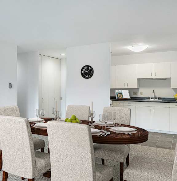 a living room with a couch and a table on a balcony at Humboldt Senior 55+ Apartments, Saint Paul, MN, 55107