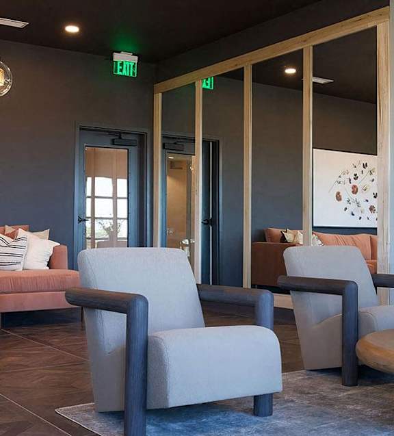 Cozy seating and mood lighting for intimate conversation or drinks at Novel Cary