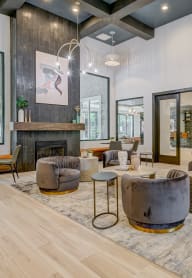 Centerview at Crossroads Pool with Lounge Chairs at Crossroads sitting area and fireplace at Centerview at Crossroads, Raleigh, NC