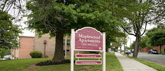 a sign in front of a building