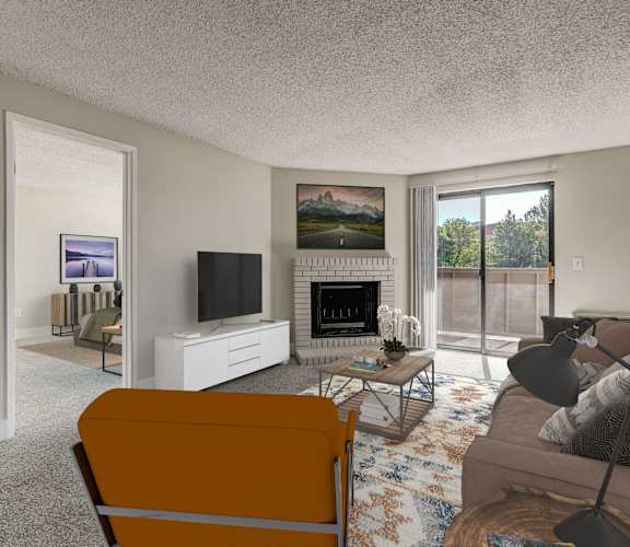 a living room with a couch and a chair and a fireplace
