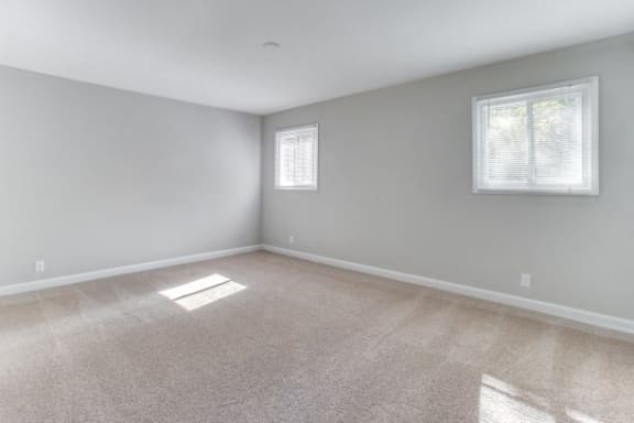 Bedroom With Carpeting at The Mason Mills Apartments, Georgia
