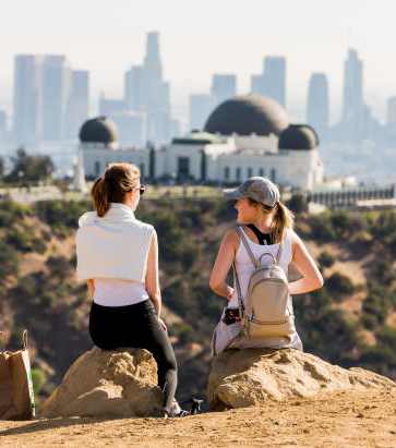 two girls standing on a hill near the Griffith Observatory at Waverly, Los Angeles, CA