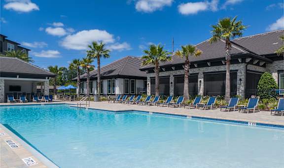 Lounge Swimming Pool With Cabana at The Oasis at Town Center Apartments, Florida, 32246
