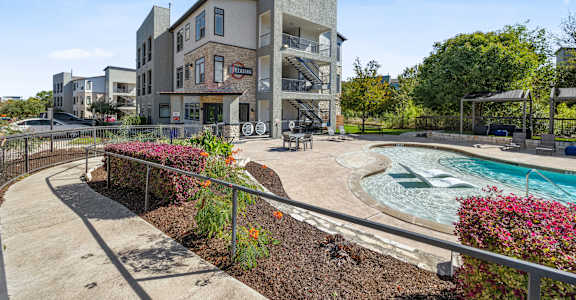 the preserve at ballantyne commons apartments swimming pool and building exterior at Radius on Grove, Austin