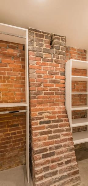 a bathroom with a shower and a door