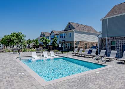 our apartments have a swimming pool with lounge chairs