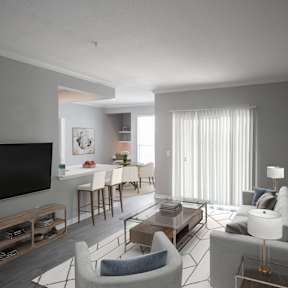 A modern living room with a television, sofas, and a dining table.