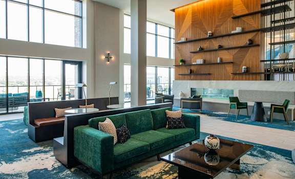 Couch in living room at The Apex at CityPlace, Overland Park
