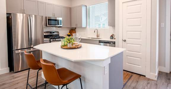 Kitchen with cabinetry at Mission at Johnson Creek, Arlington, 76015