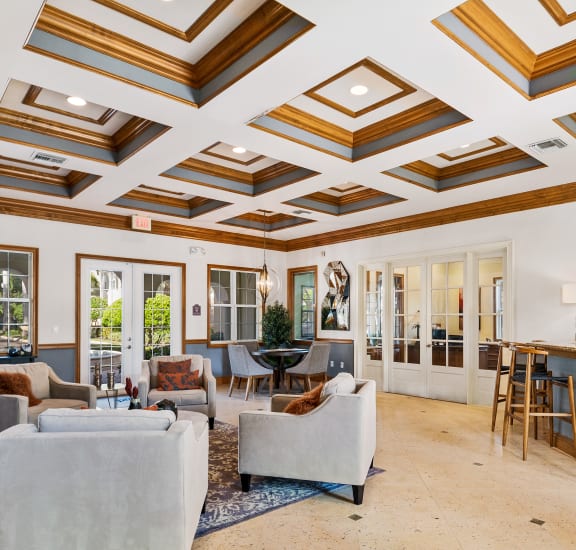 a living room with coffered ceilings