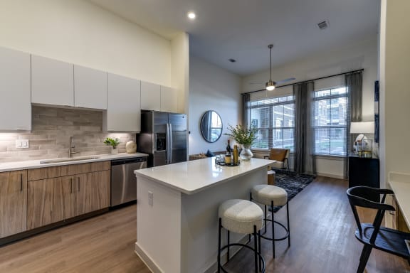 a rendering of a living room and kitchen in a house