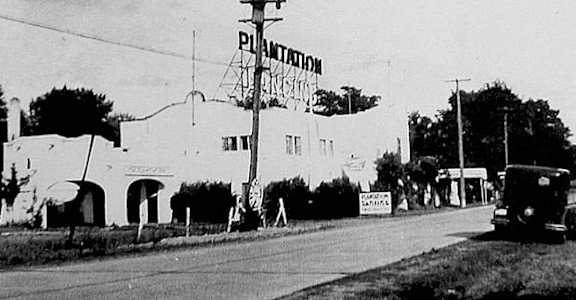 A black and white photo of a building with the word  at The Barnum Apartments, White Bear Lake, MN,  55110