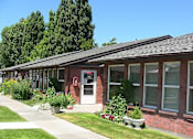 Thumbnail 1 of 5 - Property elevation with landscaping