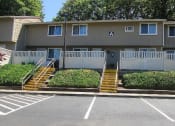 Thumbnail 1 of 18 - Building and parking lot
