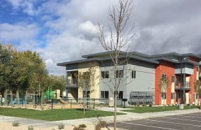 view of Playground and building