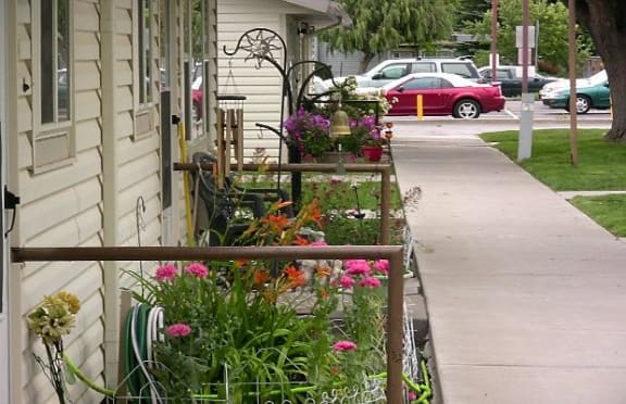 view of sidewalk to parking area