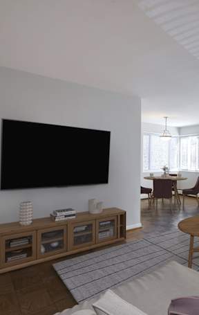 Living room and dining room at Chevy Chase, DC Apartment at Legation House in Washington, DC 20015