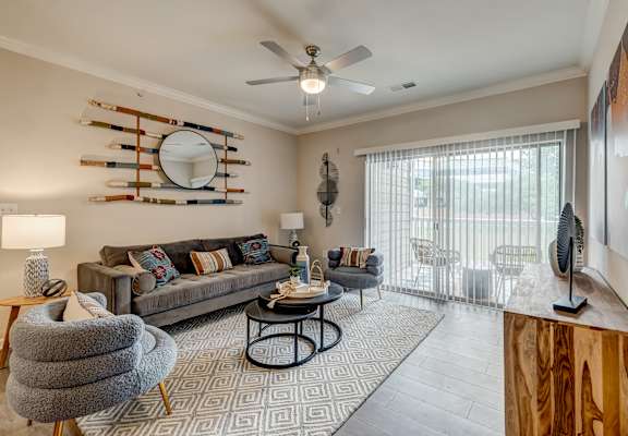 create memories that last a lifetime in your new home at Crossroads sitting area and fireplace at Centerview at Crossroads, Raleigh, NC, 27609